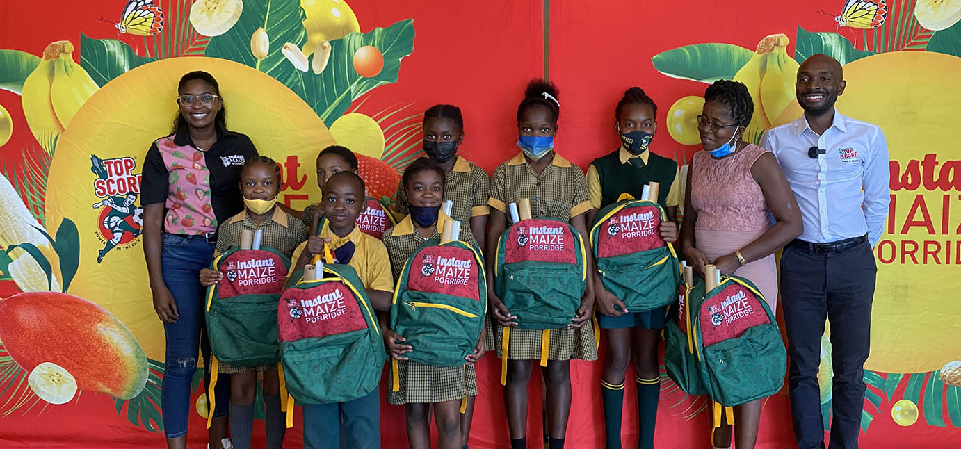 Top Score Instant Maize Porridge donates backpacks